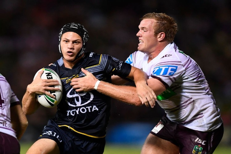 KALYN PONGA of the Cowboys is tackled by Jake Trbojevic of the Sea Eagles during the NRL match between the North Queensland Cowboys and the Manly Sea Eagles at 1300SMILES Stadium in Townsville, Australia. KALYN PONGA of the Cowboys is tackled by Jake Trbojevic of the Sea Eagles during the NRL match between the North Queensland Cowboys and the Manly Sea Eagles at 1300SMILES Stadium in Townsville, Australia.