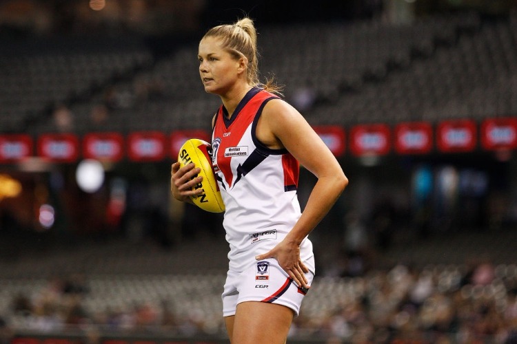 KATIE BRENNAN of Darebin kicks for goal during the VFL Women's Grand Final match between Diamond Creek and Darebin at Etihad Stadium in Melbourne, Australia.