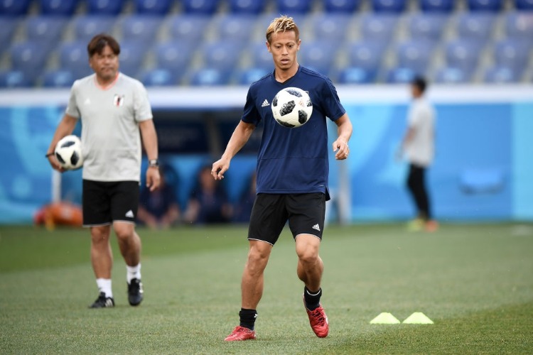 KEISUKE HONDA of Japan during a Japan training session and press conference ahead of the FIFA World Cup Group H match between Poland and Japan at Volgograd Arena in Volgograd, Russia.