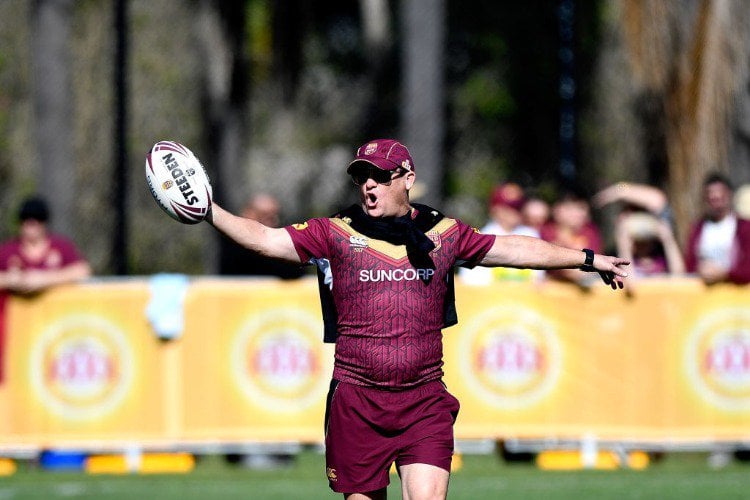Coach KEVIN WALTERS calls out instructions to his players during a Queensland Maroons State of Origin training session at Sanctuary Cove in Brisbane, Australia.