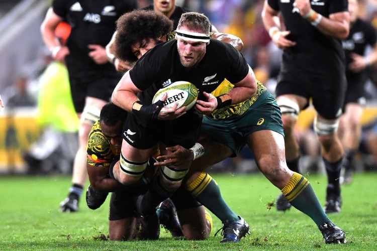 KIERAN READ of the All Blacks takes on the defence during the Bledisloe Cup match between the Australian Wallabies and the New Zealand All Blacks at Suncorp Stadium in Brisbane, Australia.
