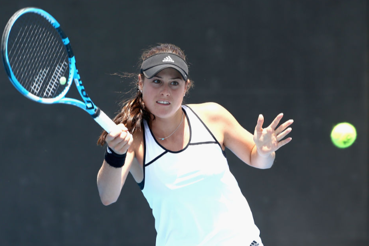 KIMBERLY BIRRELL of Australia competes against Naiktha Bains and Sara Tomic of Australia in her first round Australian Open December Showdown match at Melbourne Park in Melbourne, Australia. KIMBERLY BIRRELL of Australia competes against Naiktha Bains and Sara Tomic of Australia in her first round Australian Open December Showdown match at Melbourne Park in Melbourne, Australia.