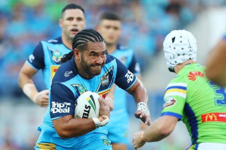 KONRAD HURRELL of the Titans runs the ball during the NRL match between the Gold Coast Titans and the Canberra Raiders at Cbus Super Stadium in Gold Coast, Australia.