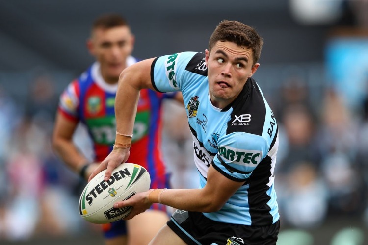 KYLE FLANAGAN of the Sharks passes during the NRL match between the Cronulla Sharks and the Newcastle Knights at SCG Stadium in Sydney, Australia.