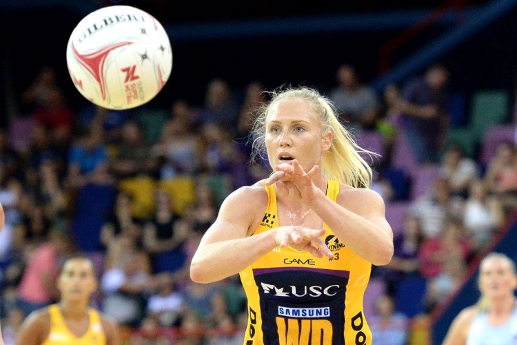LAURA LANGMAN of the Lightning passes the ball during the Super Netball match between the Lightning and the Magpies at Brisbane EC in Brisbane, Australia.