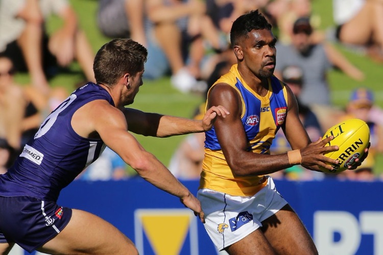 LIAM RYAN of the Eagles is tackled by DARGY TUCKER of the Dockers during the JLT Community Series AFL match between the Fremantle Dockers and the West Coast Eagles at HBF Arena in Perth, Australia.