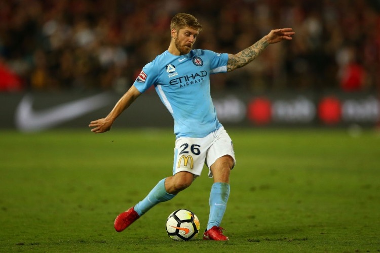 LUKE BRATTAN of City kicks the ball during the A-League match between the Western Sydney Wanderers and Melbourne City at ANZ Stadium in Sydney, Australia.