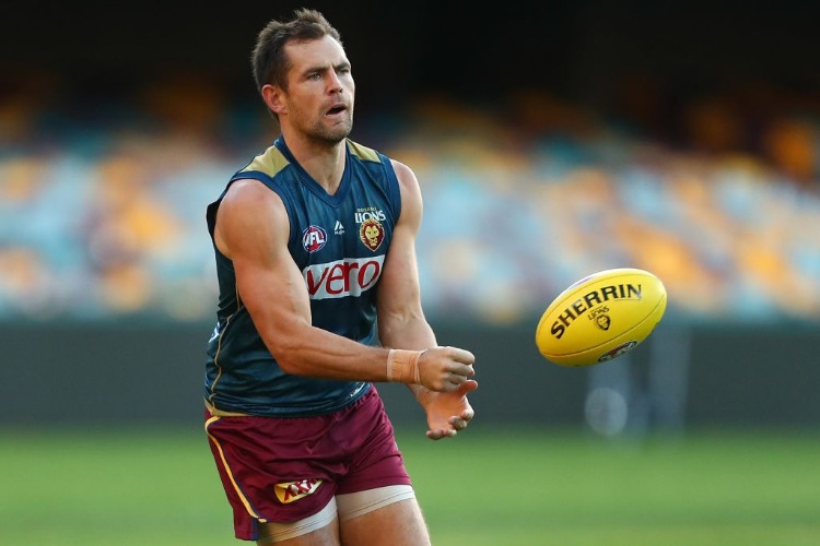 LUKE HODGE handballs during the Brisbane Lions AFL training session at The Gabba in Brisbane, Australia. LUKE HODGE handballs during the Brisbane Lions AFL training session at The Gabba in Brisbane, Australia.