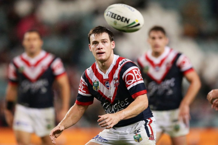 LUKE KEARY of the Roosters takes the ball during the NRL match between the Sydney Roosters and the Brisbane Broncos at Allianz Stadium in Sydney, Australia.