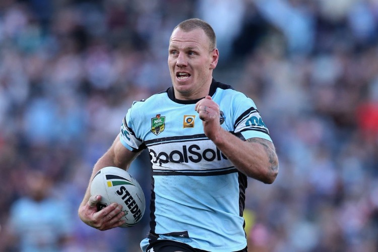 LUKE LEWIS of the Sharks in action during the NRL match between the Sydney Roosters and the Cronulla Sharks at Central Coast Stadium in Gosford, Australia.