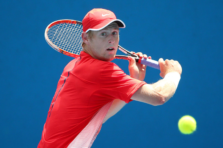 LUKE SAVILLE of Australia plays a backhand in his match against Amir Weintraub of Israel at Australian Open Qualifying in Melbourne, Australia.