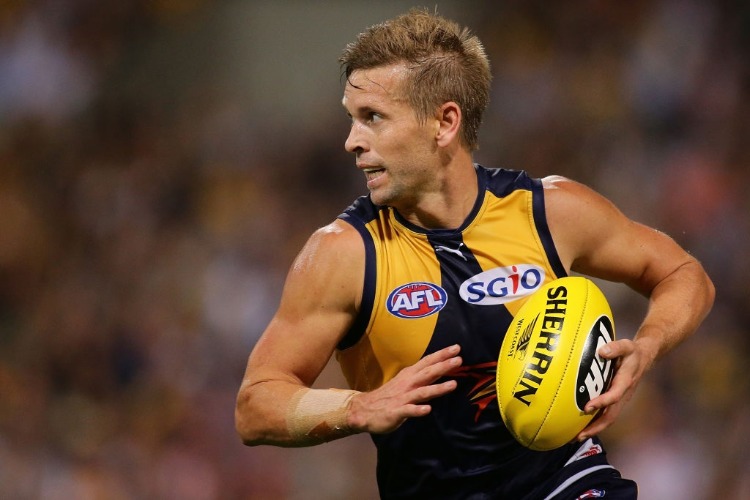 MARK LECRAS of the Eagles looks to pass the ball during the AFL match between the West Coast Eagles and the Sydney Swans at Domain Stadium in Perth, Australia.