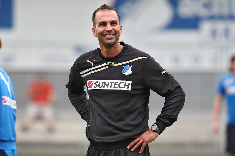 MARKUS BABBEL, head coach of Hoffenheim looks on during the training session of TSG 1899 Hoffenheim for the upcoming Bundesliga season at Dietmar-Hopp-Stadion in Sinsheim, Germany. MARKUS BABBEL, head coach of Hoffenheim looks on during the training session of TSG 1899 Hoffenheim for the upcoming Bundesliga season at Dietmar-Hopp-Stadion in Sinsheim, Germany.