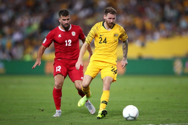 MARTIN BOYLE of Australia contests the ball during the International Friendly Match between the Australian Socceroos and Lebanon at ANZ Stadium in Sydney, Australia.