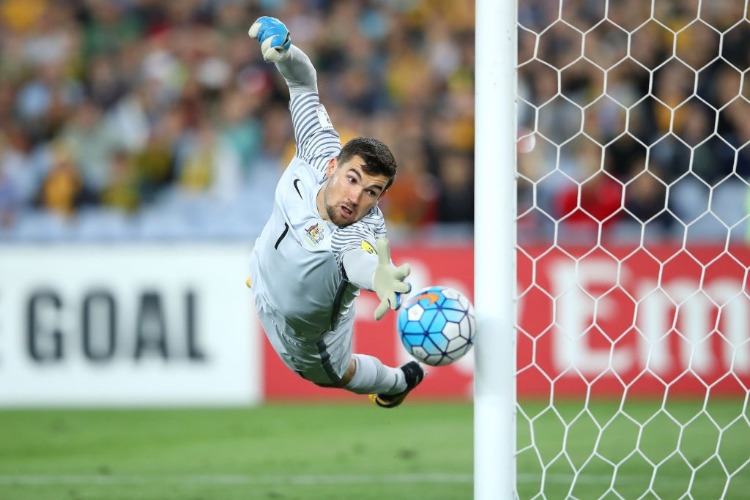 MAT RYAN of Australia saves a goal during the 2018 FIFA World Cup Asian Playoff match between the Australian Socceroos and Syria at ANZ Stadium in Sydney, Australia.
