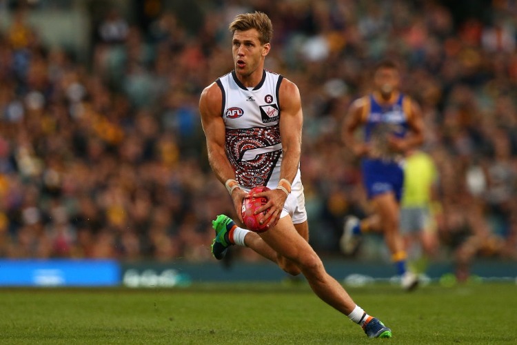MATT DE BOER of the Giants looks to pass the ball during the AFL match between the West Coast Eagles and the Greater Western Giants at Domain Stadium in Perth, Australia.