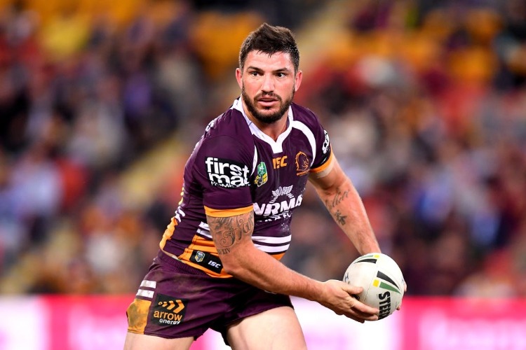 MATT GILLETT of the Broncos looks to pass during the NRL match between the Brisbane Broncos and the Canterbury Bulldogs at Suncorp Stadium in Brisbane, Australia.