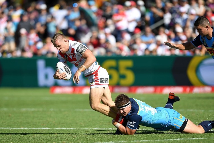 MATTHEW DUFTY of the Dragons takes on the defence during the NRL match between the Gold Coast Titans and the St George Illawarra Dragons at Clive Berghofer Stadium in Toowoomba, Australia. MATTHEW DUFTY of the Dragons takes on the defence during the NRL match between the Gold Coast Titans and the St George Illawarra Dragons at Clive Berghofer Stadium in Toowoomba, Australia.
