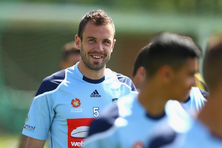 MATTHEW JURMAN of Sydney FC looks on during a Sydney Fc A-League training session at Macquarie Uni in Sydney, Australia.