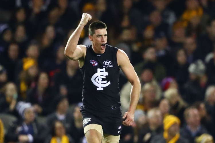 MATTHEW KREUZER of the Blues celebrates after kicking a goal during the AFL match between the Carlton Blues and the Hawthorn Hawks at Etihad Stadium in Melbourne, Australia.