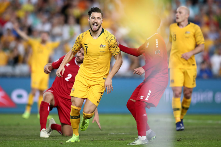 MATTHEW LECKIE of Australia celebrates scoring a goal between the Australian Socceroos and Lebanon at ANZ Stadium in Sydney, Australia. MATTHEW LECKIE of Australia celebrates scoring a goal between the Australian Socceroos and Lebanon at ANZ Stadium in Sydney, Australia.