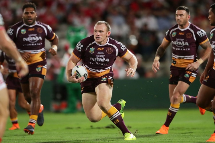 MATTHEW LODGE of the Broncos runs with the ball during the NRL match between the St George Illawarra Dragons and the Brisbane Broncos at UOW Jubilee Oval in Sydney, Australia. MATTHEW LODGE of the Broncos runs with the ball during the NRL match between the St George Illawarra Dragons and the Brisbane Broncos at UOW Jubilee Oval in Sydney, Australia.