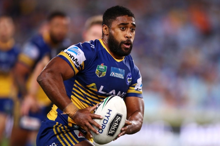 MICHAEL JENNINGS of the Eels runs the ball during the NRL match between the Parramatta Eels and the Wests Tigers at ANZ Stadium Sydney, Australia.