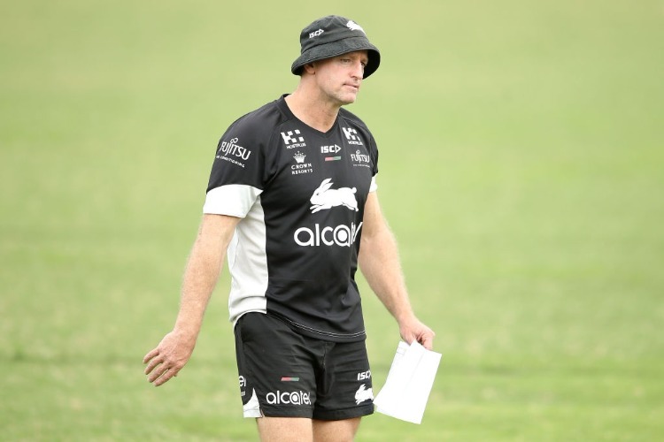Rabbitohs coach MICHAEL MAGUIRE watches on during a South Sydney Rabbitohs NRL training session at Redfern Oval in Sydney, Australia.