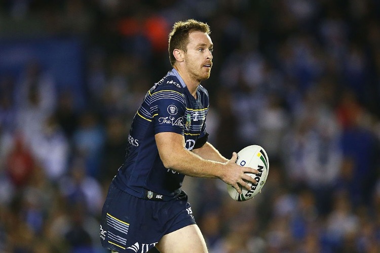 MICHAEL MORGAN of the Cowboys runs the ball during the NRL match between the Canterbury Bulldogs and the North Queensland Cowboys at Belmore Sports Ground in Sydney, Australia.