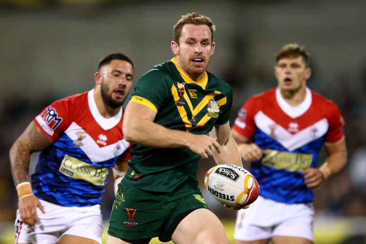 MICHAEL MORGAN of Australia makes a line break during the 2017 Rugby League World Cup match between Australian Kangaroos and France at Canberra Stadium in Canberra, Australia.