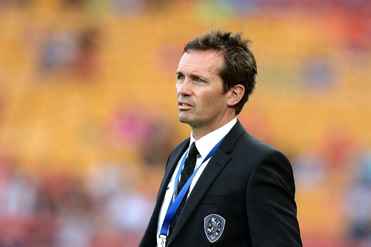 Coach MIKE MULVEY of the Roar watches on during the A-League match between the Brisbane Roar and Adelaide United at Suncorp Stadium in Brisbane, Australia.
