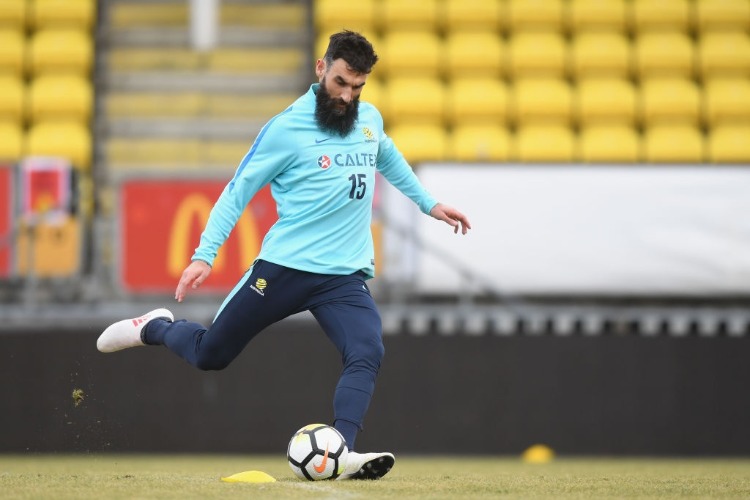 MILE JEDINAK in action during an Australian Socceroos training at Arasen Stadion in Oslo, Norway.