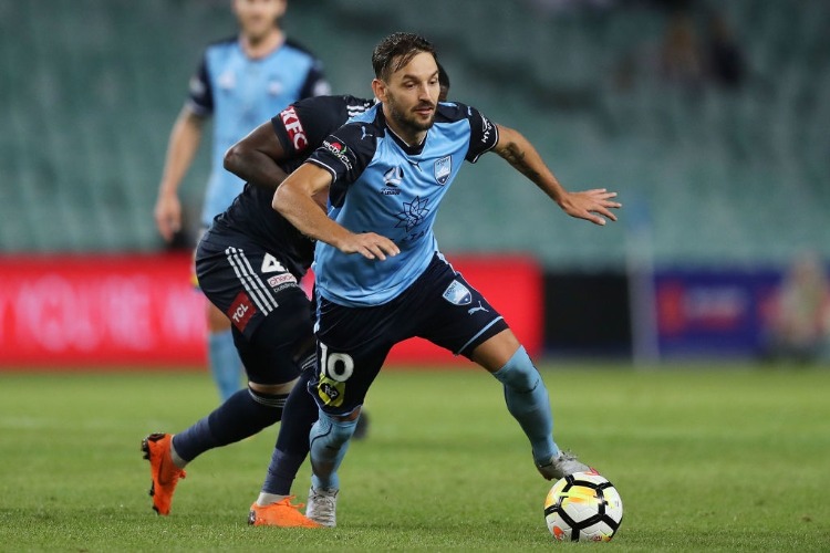 MILOS NINKOVIC of Sydney FC in action during the A-League Semi Final match between Sydney FC and Melbourne Victory at Allianz Stadium in Sydney, Australia.