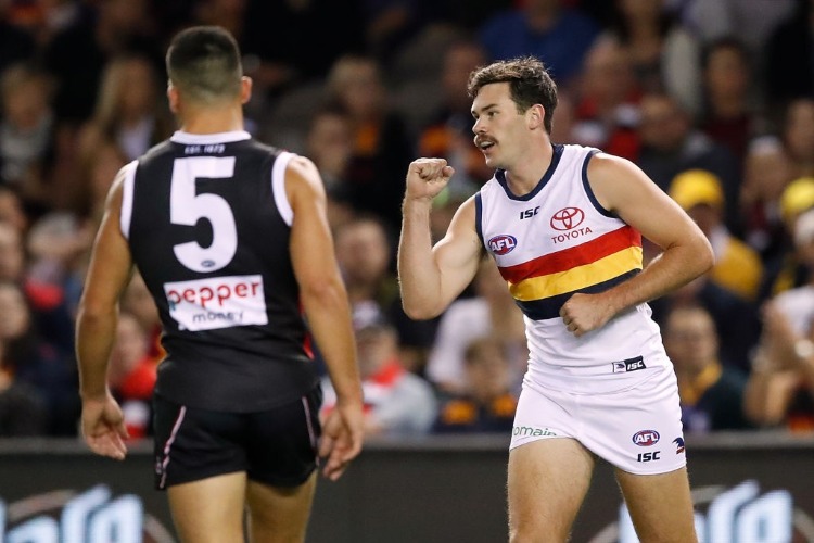 MITCH MCGOVERN of the Crows celebrates a goal during the 2018 AFL match between the St Kilda Saints and the Adelaide Crows at Etihad Stadium in Melbourne, Australia.