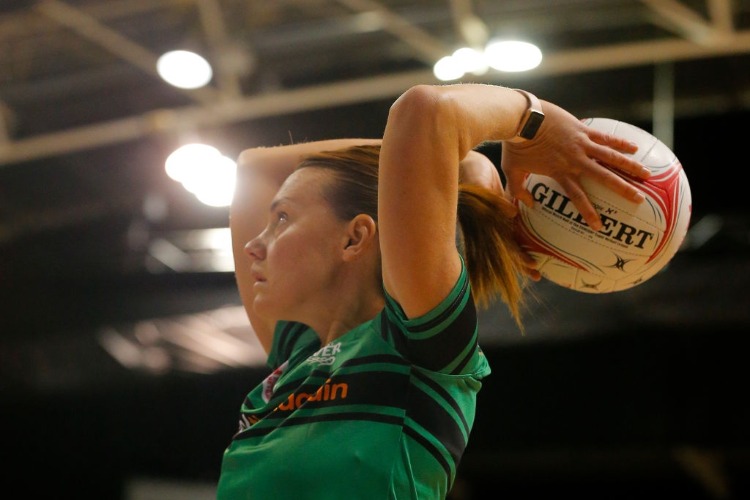 NATALIE MEDHURST of the West Coast Fever practices her shooting before the Super Netball match between the Fever and the Swifts at HBF Stadium in Perth, Australia.