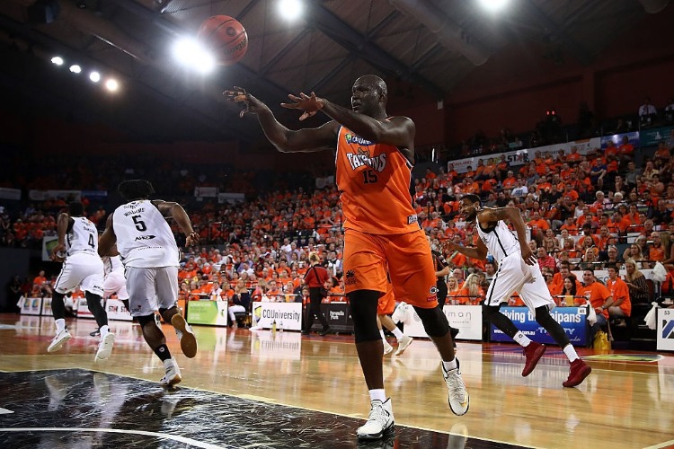 NATE JAWAI of the Taipans passes during the NBL match between the Cairns Taipans and Melbourne United at Cairns Convention Centre in Cairns, Australia. NATE JAWAI of the Taipans passes during the NBL match between the Cairns Taipans and Melbourne United at Cairns Convention Centre in Cairns, Australia.