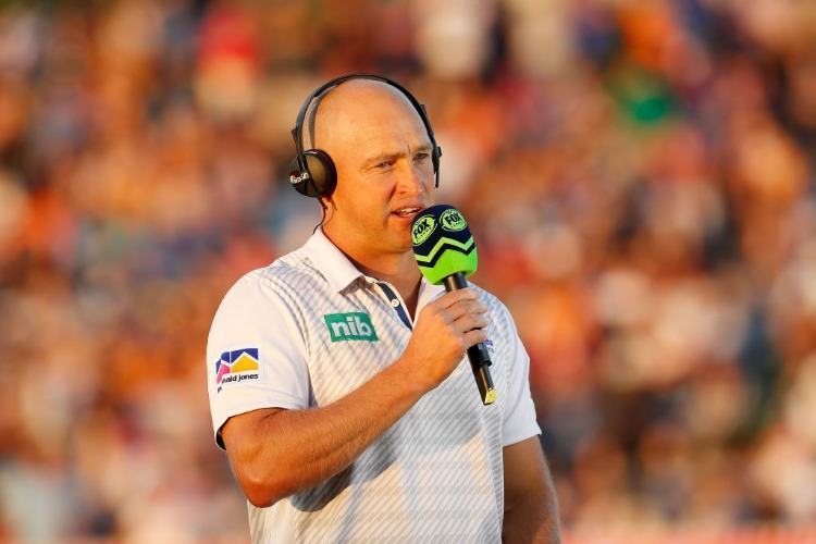 NATHAN BROWN head coach of the Knights is interviewed prior to the NRL match between the Wests Tigers and the Newcastle Knights at Scully Park in Tamworth, Australia.