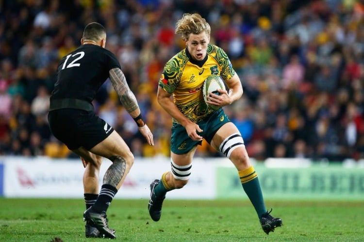 Australia's NED HANIGAN runs with the ball during the Bledisloe Cup match between the Australian Wallabies and the New Zealand All Blacks at Suncorp Stadium in Brisbane, Australia.