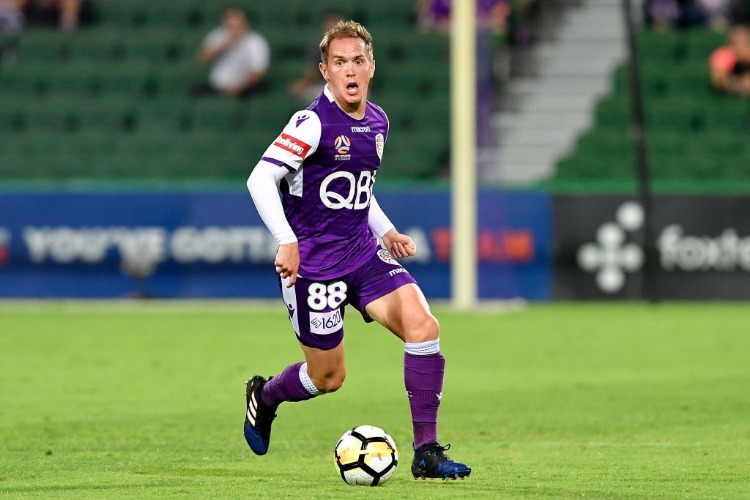 NEIL KILKENNY of the Glory move the ball foward during the A-League match between the Perth Glory and the Central Coast Mariners at nib Stadium in Perth, Australia.