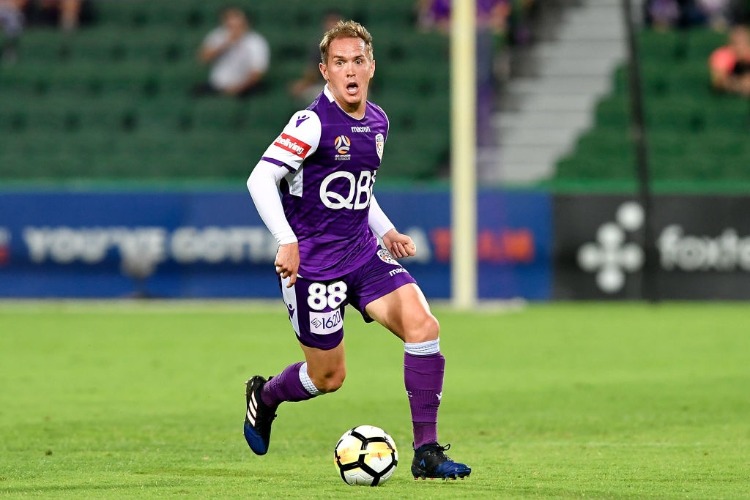 NEIL KILKENNY of the Glory move the ball foward during the A-League match between the Perth Glory and the Central Coast Mariners at nib Stadium in Perth, Australia. NEIL KILKENNY of the Glory move the ball foward during the A-League match between the Perth Glory and the Central Coast Mariners at nib Stadium in Perth, Australia.