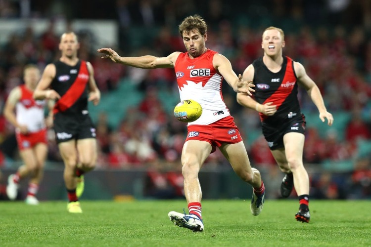 NICK SMITH of the Swans kicks during the AFL match between the Sydney Swans and the Essendon Bombers at SCG in Sydney, Australia.