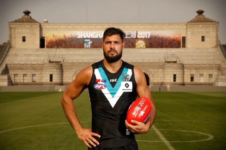 PADDY RYDER of the Power poses for a photograph during the Port Adelaide Power training session in Shanghai, China.