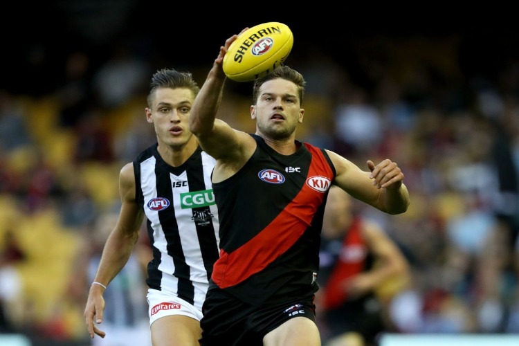 PATRICK AMBROSE of the Essendon Bombers takes the ball during the 2017 JLT Community Series match between the Collingwood Magpies and Essendon Bombers at Etihad Stadium in Melbourne, Australia.