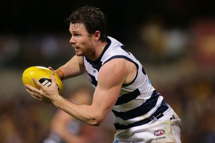 PATRICK DANGERFIELD of the Cats looks to pass the ball during the AFL match between the West Coast Eagles and the Geelong Cats at Domain Stadium in Perth, Australia.