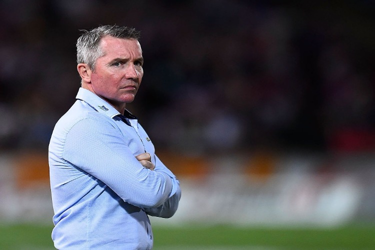 Cowboys coach PAUL GREEN looks on before the start of the NRL match between the North Queensland Cowboys and the Brisbane Broncos at 1300SMILES Stadium in Townsville, Australia. Cowboys coach PAUL GREEN looks on before the start of the NRL match between the North Queensland Cowboys and the Brisbane Broncos at 1300SMILES Stadium in Townsville, Australia.