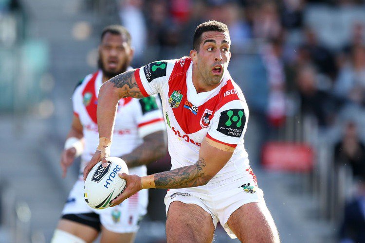 PAUL VAUGHAN of the Dragons looks to pass during the NRL match between the St George Illawarra Dragons and the Manly Sea Eagles at WIN Stadium in Wollongong, Australia.