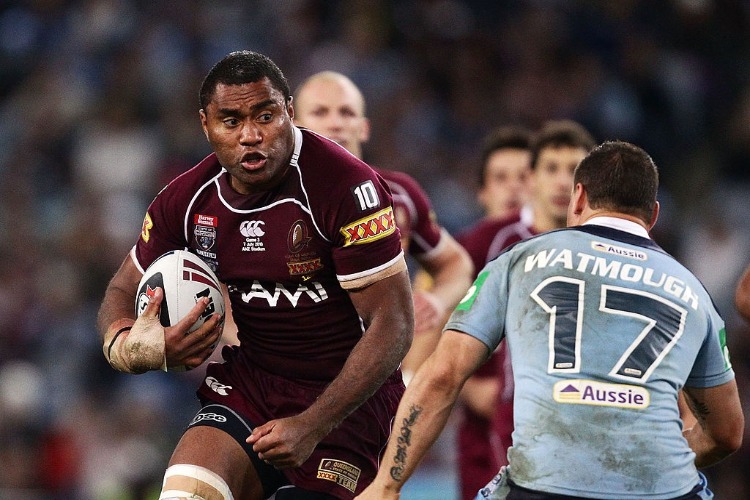 PETERO CIVONICEVA of the Maroons runs at Anthony Watmough of the Blues during game three of the ARL State of Origin series between the New South Wales Blues and the Queensland Maroons at ANZ Stadium in Sydney, Australia.