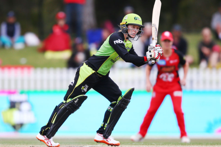 RACHAEL HAYNES of the Thunder bats during the Women's Big Bash League match between the Melbourne Renegades and the Sydney Thunder at the CitiPower Centre in Melbourne, Australia. RACHAEL HAYNES of the Thunder bats during the Women's Big Bash League match between the Melbourne Renegades and the Sydney Thunder at the CitiPower Centre in Melbourne, Australia.
