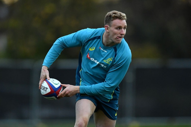 REECE HODGE of Australia looks for a pass during a training session at the Lensbury Hotel in London, England.