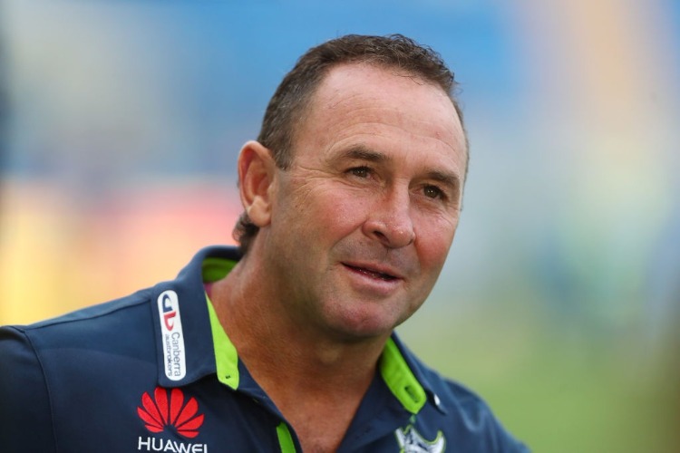 Raiders coach RICKY STUART looks on before the NRL match between the Gold Coast Titans and the Canberra Raiders at Cbus Super Stadium in Gold Coast, Australia. Raiders coach RICKY STUART looks on before the NRL match between the Gold Coast Titans and the Canberra Raiders at Cbus Super Stadium in Gold Coast, Australia.